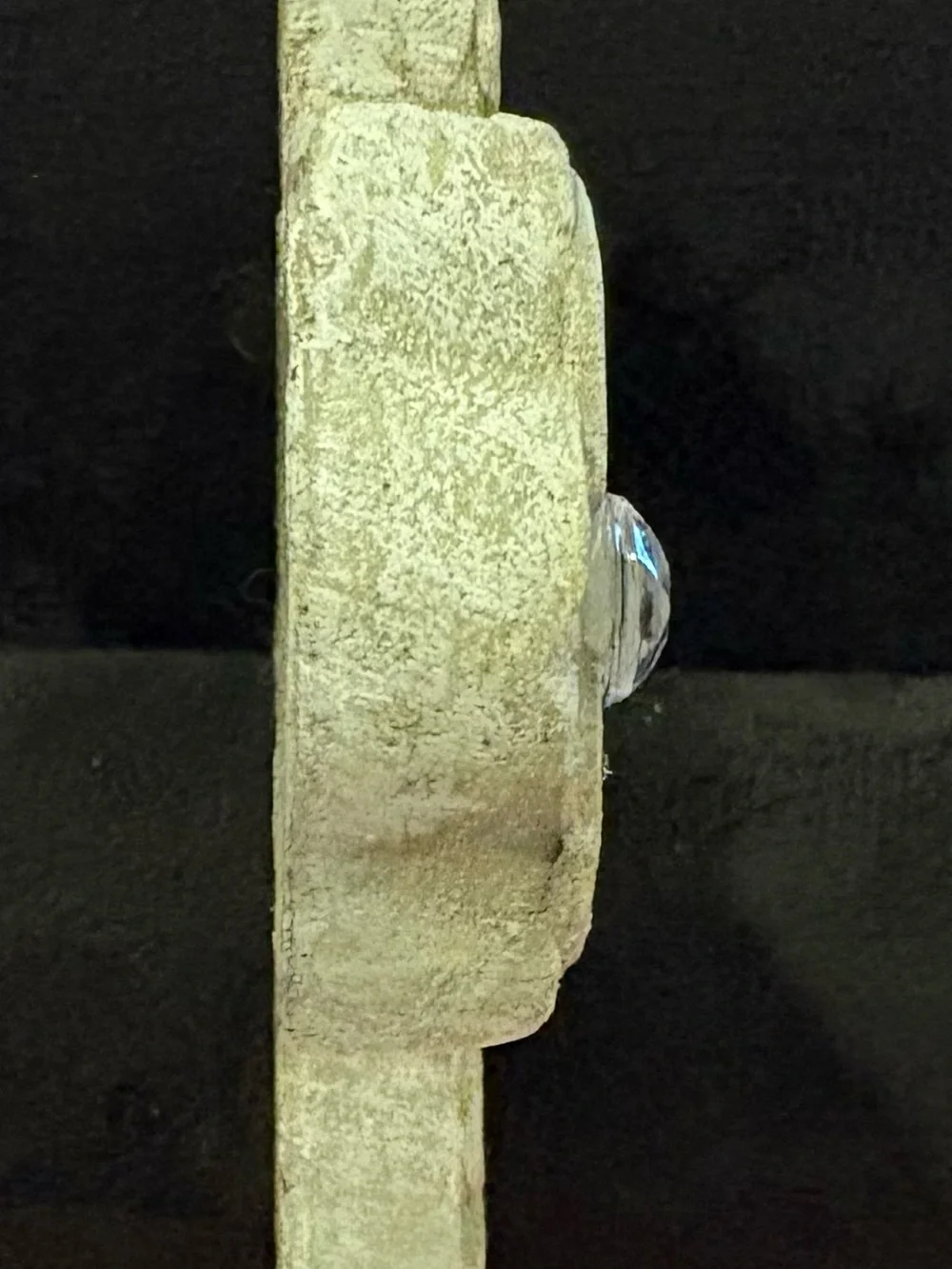 Ornate grey stone-look wall cross